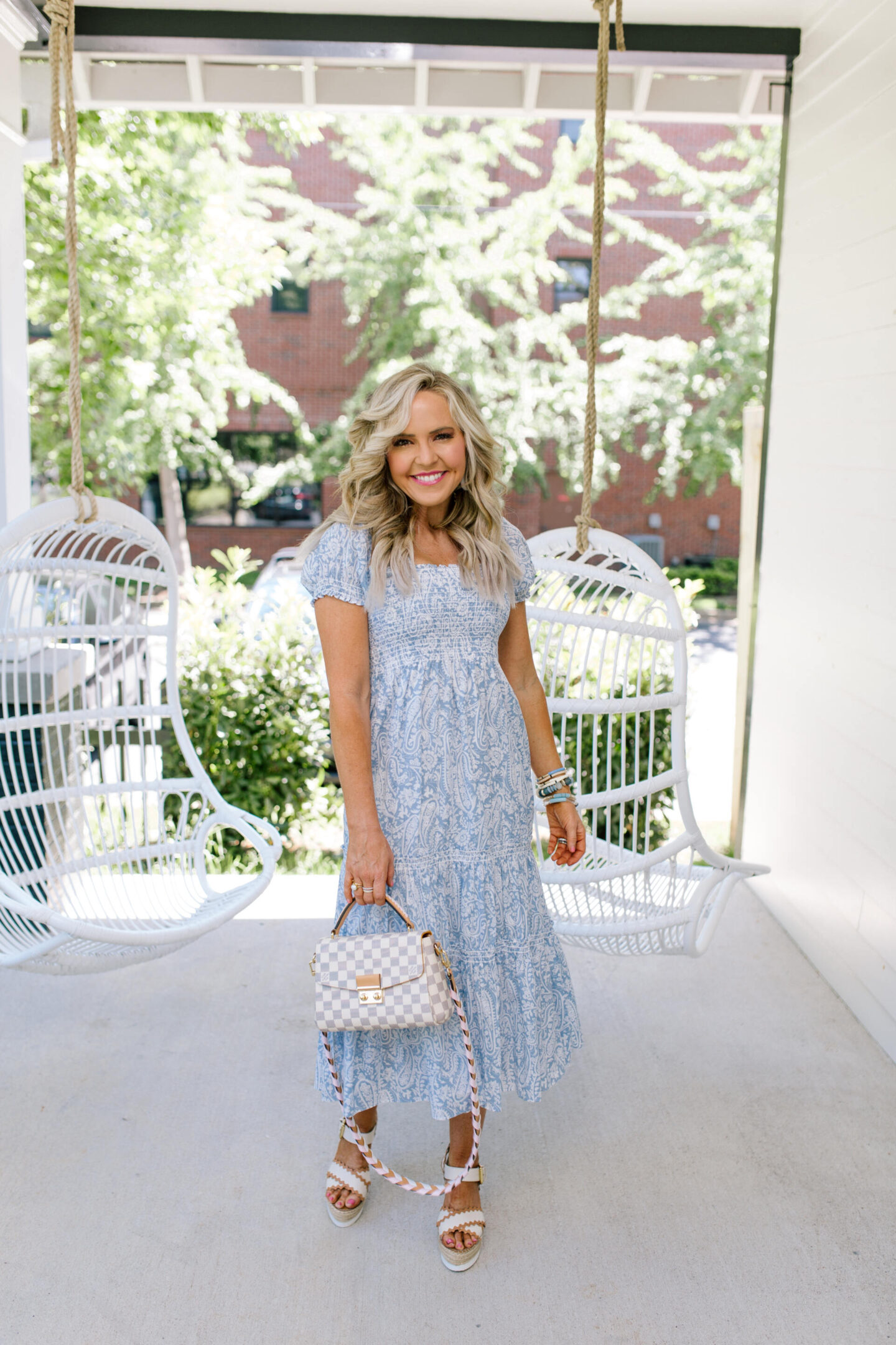 Summer Dresses by popular Nashville of Natasha Stoneking wearing a OPT Daphne dress, Glyn espadrilles, and holding a croisette crossbody. 