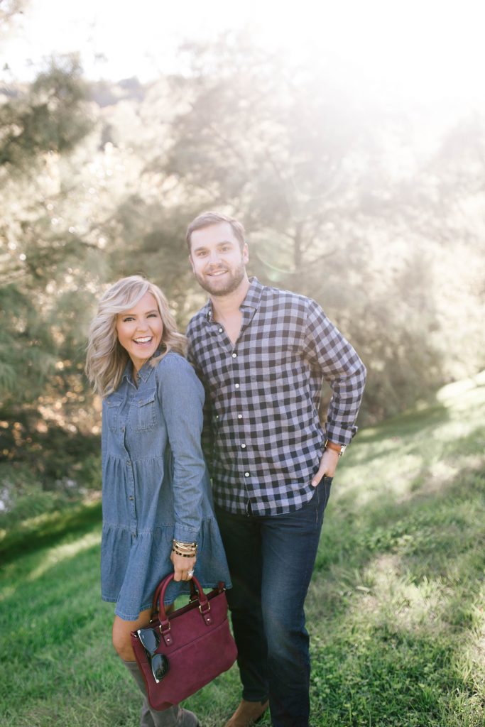 Date Night Outfit Ideas Done Right | Bonobos Style by popular Nashville fashion blog, Hello Happiness: image of a man walking with his wife outside and wearing a Bonobos button down shirt, Bonobos Stretch Eco Jeans and Bonobos The Alpern Chelsea Boot.