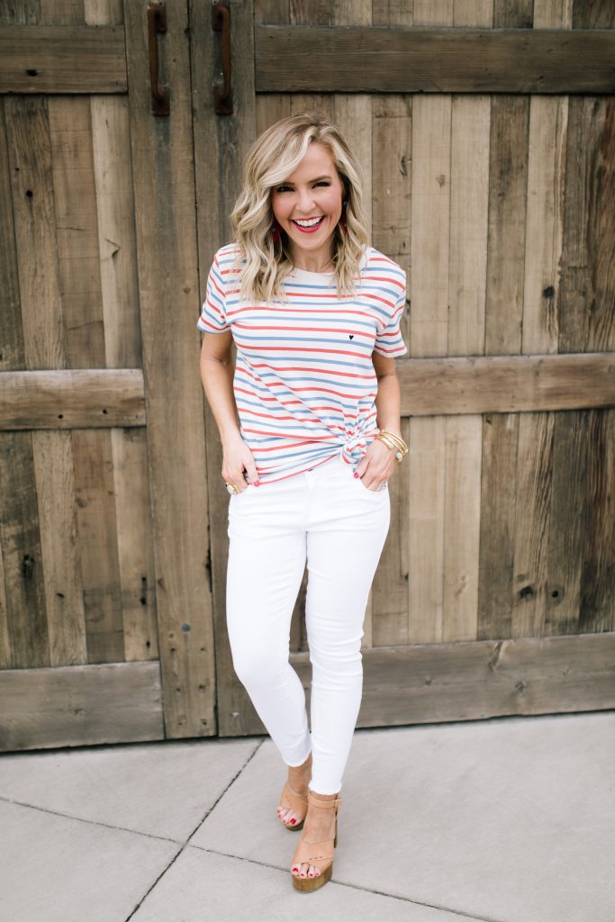 Happy Valentine's Day featured by top US life and style blog Hello! Happiness; Image of a woman wearing an Evereve striped shirt, Evereve white skinny jeans and Steve Madden sandals.