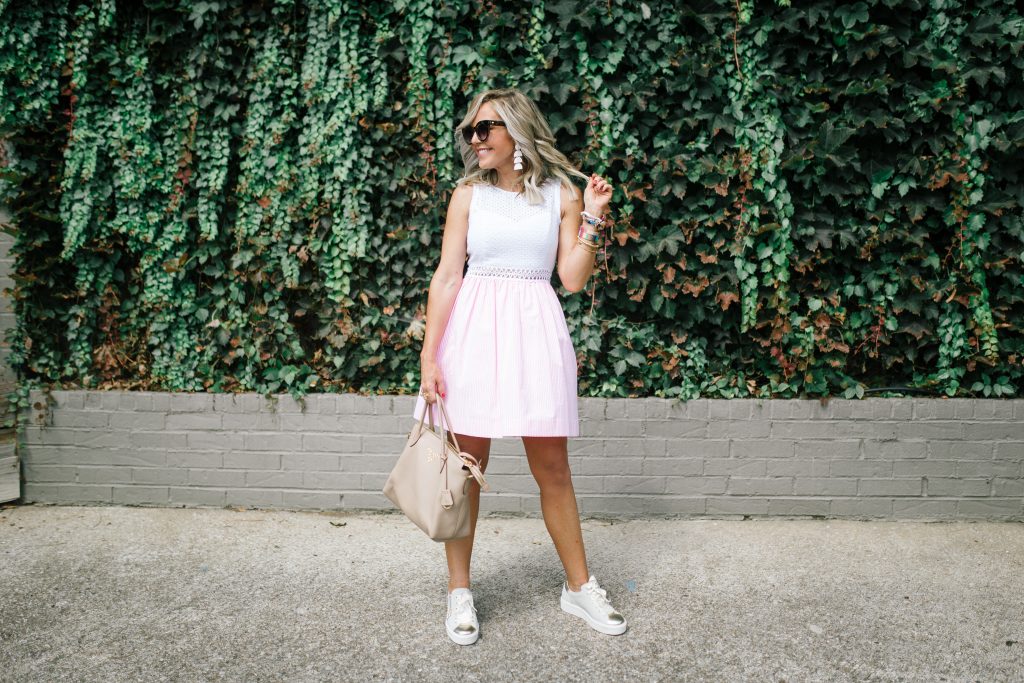 The Lilly Pulitzer After Party Sale is LIVE! by popular Nashville fashion blog, Hello Happiness: image of a woman wearing a Lilly Pulitzer Alivia Dress and NERO GIARDINI sneakers.