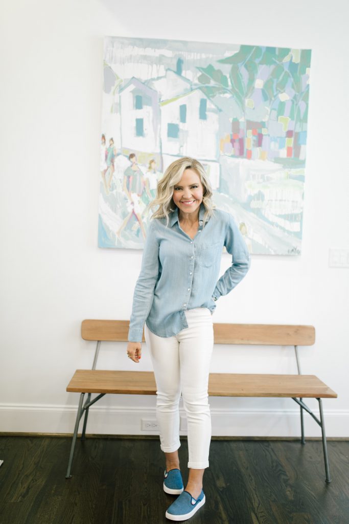 Walmart EV1 featured by top US fashion blog Hello! Happiness; Image of a woman wearing a button-up shirt, white skinny jeans and slip on shoes from Walmart.