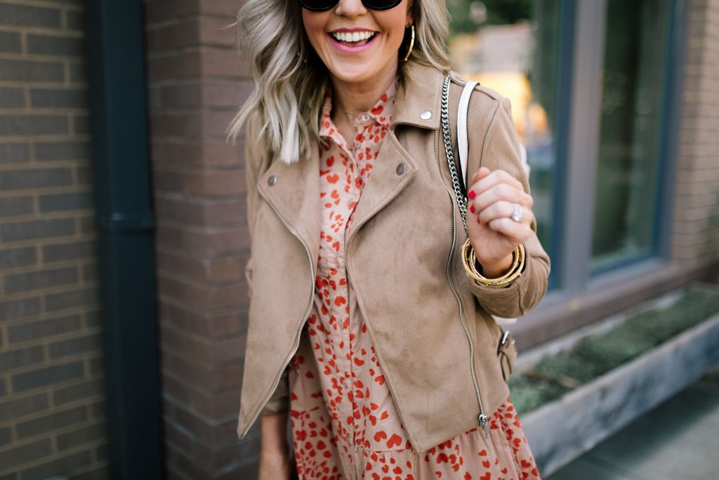 Fall Street Style with Marks and Spencer...by popular Nashville fashion blog, Hello Happiness: image of a woman standing outside of a restaurant and wearing a Marks and Spencer PER UNA Pure Cotton Printed Tiered Shirt Maxi Dress, Marks and Spencer M&S COLLECTION Leather Suede Panel Lace-up Trainers, Marks and Spencer M&S COLLECTION PETITE Faux Suede Biker Jacket, and carrying a Marks and Spencer M&S COLLECTION Chain Detail Quilted Shoulder Bag. 