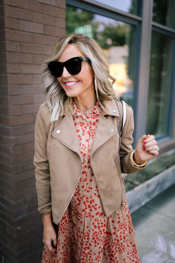 Fall Street Style with Marks and Spencer...by popular Nashville fashion blog, Hello Happiness: image of a woman standing outside of a restaurant and wearing a Marks and Spencer PER UNA Pure Cotton Printed Tiered Shirt Maxi Dress, Marks and Spencer M&S COLLECTION Leather Suede Panel Lace-up Trainers, Marks and Spencer M&S COLLECTION PETITE Faux Suede Biker Jacket, and carrying a Marks and Spencer M&S COLLECTION Chain Detail Quilted Shoulder Bag. 