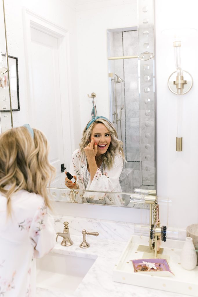 Dr Brandt Products featured by top US beauty blog Hello! Happiness; Image of a woman in her pajamas.