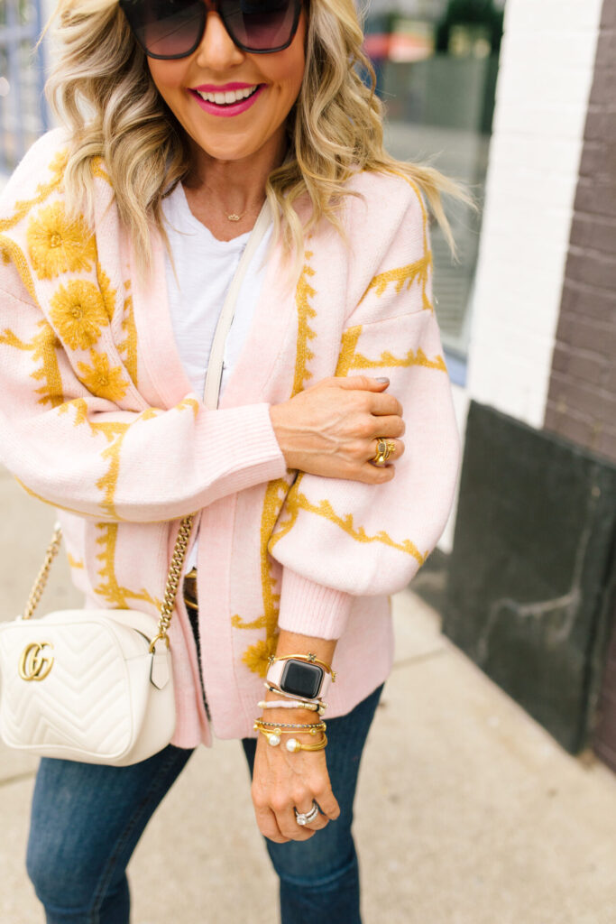 Anthropologie Sale by popular Nashville life and style blog, Hello Happiness: image of Natasha Stoneking wearing a Anthropologie Floral shine cardigan. 