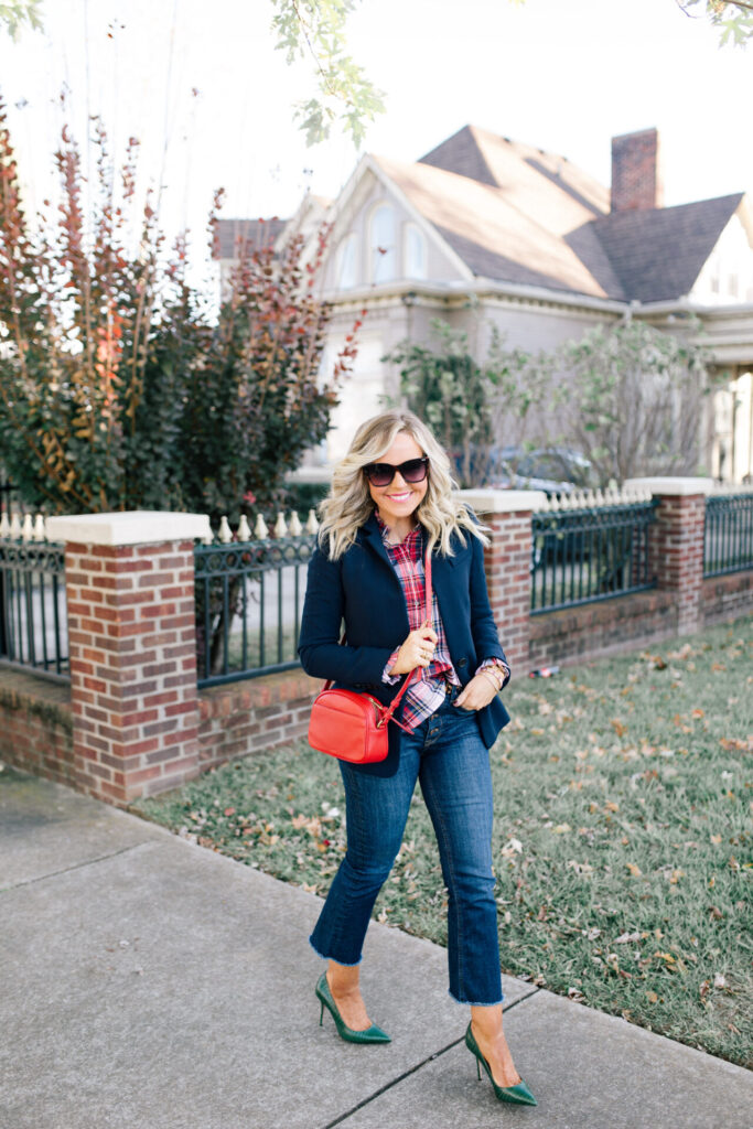 Cyber Monday Sale by popular Nashville life and style blog, Hello Happiness: image of Natasha Stoneking wearing a J. Crew Parke blazer in wool flannel, J. Crew Devon camera bag with detachable strap, J. Crew Stiletto pumps in lizard-embossed leather, J. Crew 9" demi-boot crop jean in Dark Worn wash, and J. Crew Band-collar popover tunic in pink Stewart tartan.