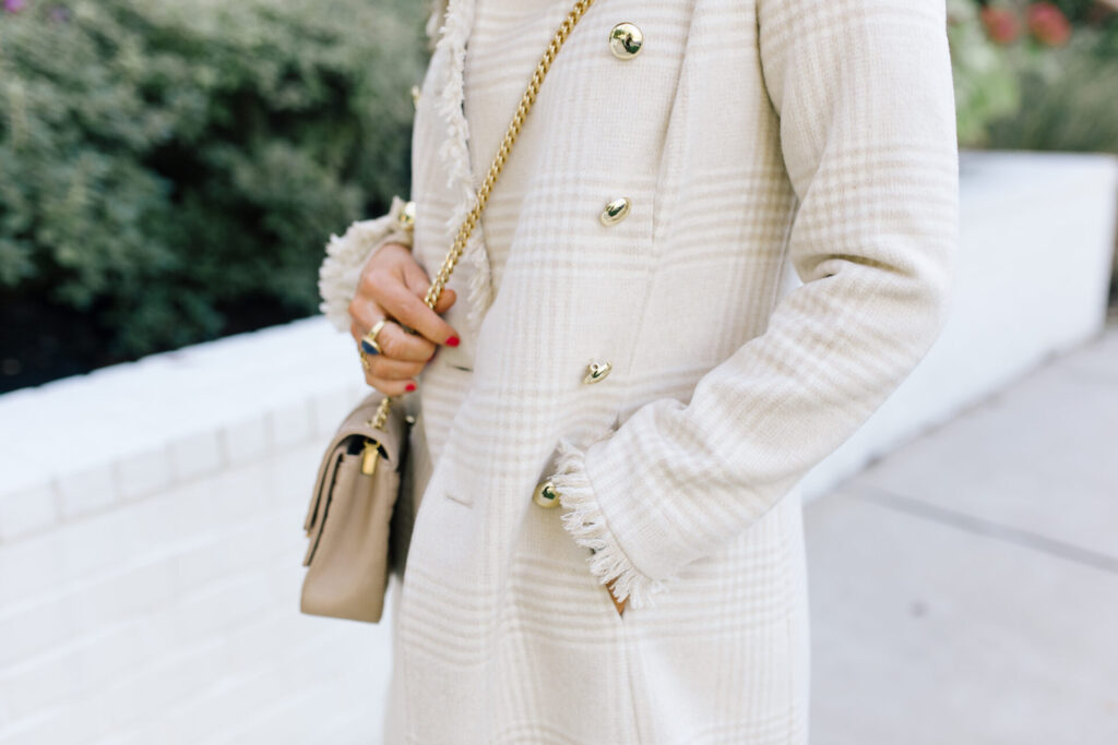 Women's Winter Coats by popular Nashville fashion blog, Hello Happiness: image of Natasha wearing a Sail to Sable double breasted houndstooth coat. 