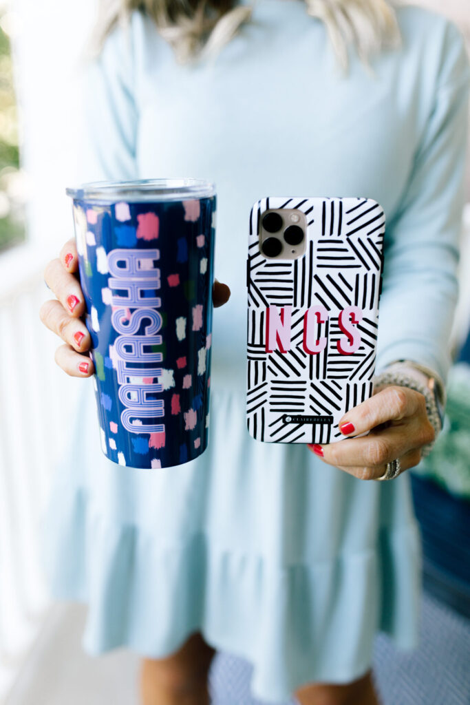 Year in Review by popular Nashville lifestyle blog, Hello Happiness: image of Natasha Stoneking holding a Clairbella Studios travel mug and Clairebella Studios phone case. 