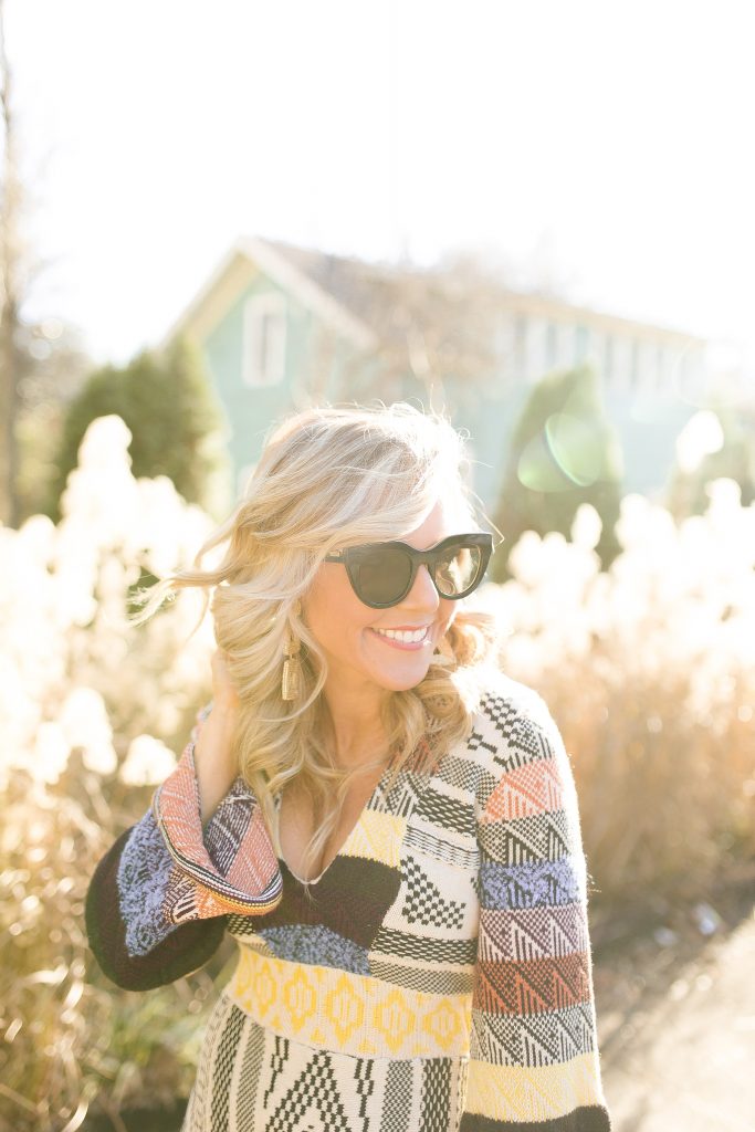 Cute Spring Dresses featured by top US fashion blog Hello! Happiness; Image of a woman wearing Free People dress, Vince Camuto booties and Nordstrom sunglasses.