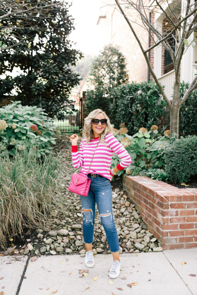 Hi Sugarplum by popular Nashville fashion blog, Hello Happiness: image of Natasha Stoneking wearing a Gibsonlook Camden Gathered Sleeve Crewneck Pullover, Abercrombie and Fitch Ultra High Rise Ankle Straight Jeans,YVES SAINT LAURENT Calfskin Y Quilted Monogram Small Loulou Chain Satchel Fresh Fuchsia, and P448 sneakers. 