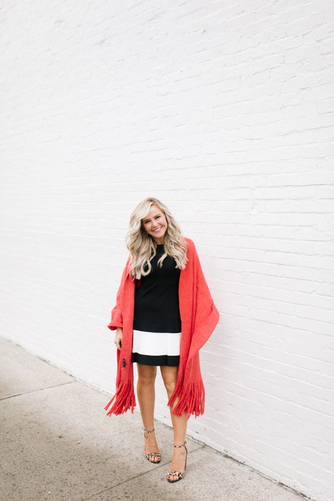 Cute Spring Dresses featured by top US fashion blog Hello! Happiness; Image of a woman wearing Nordstrom black and white dress, Shopbop leopard heels, Anthropologie scarf and Loren Hope earrings.