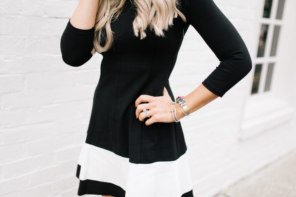 Cute Spring Dresses featured by top US fashion blog Hello! Happiness; Image of a woman wearing Nordstrom black and white dress, Shopbop leopard heels, Anthropologie scarf and Loren Hope earrings.