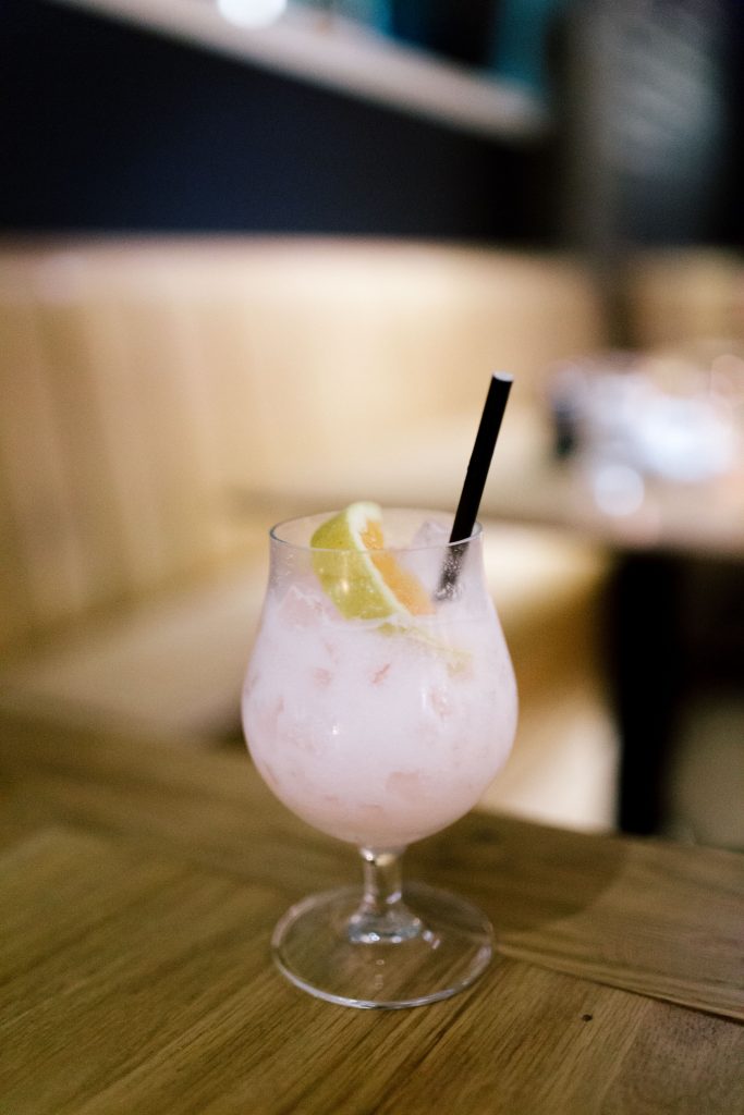 The New and Now at Noelle Nashville by popular Nashville blog, Hello Happiness: image of a drink at the Rarebird Rooftop Bar.