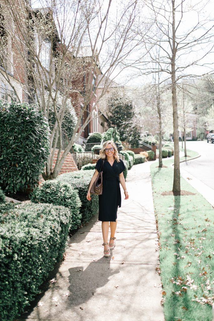 Black Midi Dress featured by top US fashion blog Hello! Happiness; Image of a woman wearing Charles Henry black dress, Sole Society flatforms and Louis Vuitton bag.