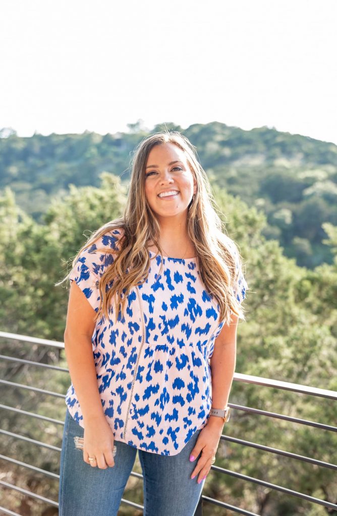 Those Hot Summer Nights... A New Collection from Gibson! by popular Nashville fashion blog Hello Happiness: image of a woman standing outside and wearing a Gibson Blush and Blue Lynx Hot Summer Nights Two Peas Trimmed Swing Top