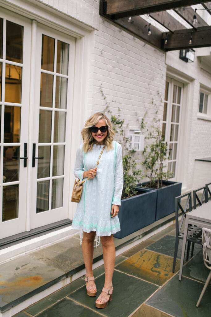 How to Support Small Business: image of a woman wearing a KMcCarthy Nashville Embroidered Long Sleeve Dress.
