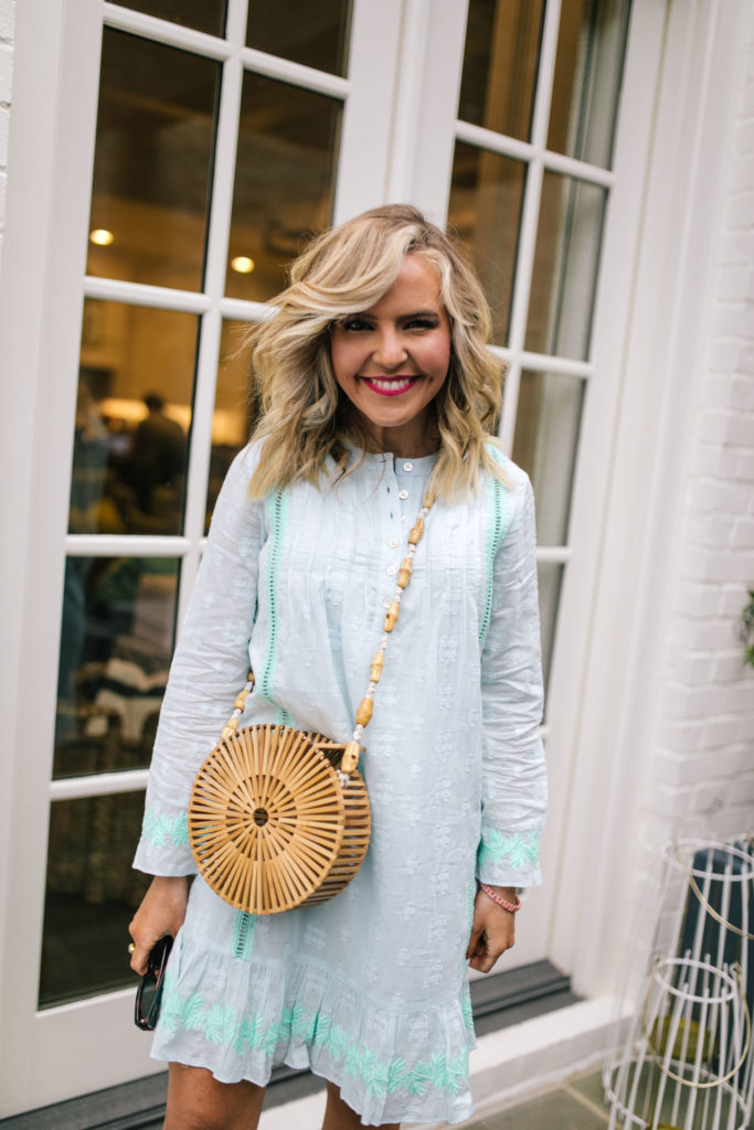 Sail to Sable by popular Nashville fashion blog, Hello Happiness: image of a woman wearing a Sail to Sable EMBROIDERED LONG SLEEVE DRESS WHITE OR SKY, Area Look Handmade Bamboo Round Crossbody Bag, Saks Fifth Avenue See by Chloé Krysty Floral Laser-Cut Suede Platform Sandals, and Nordstrom Quay Australia x JLO Limelight 54mm Oversize Sunglasses. 