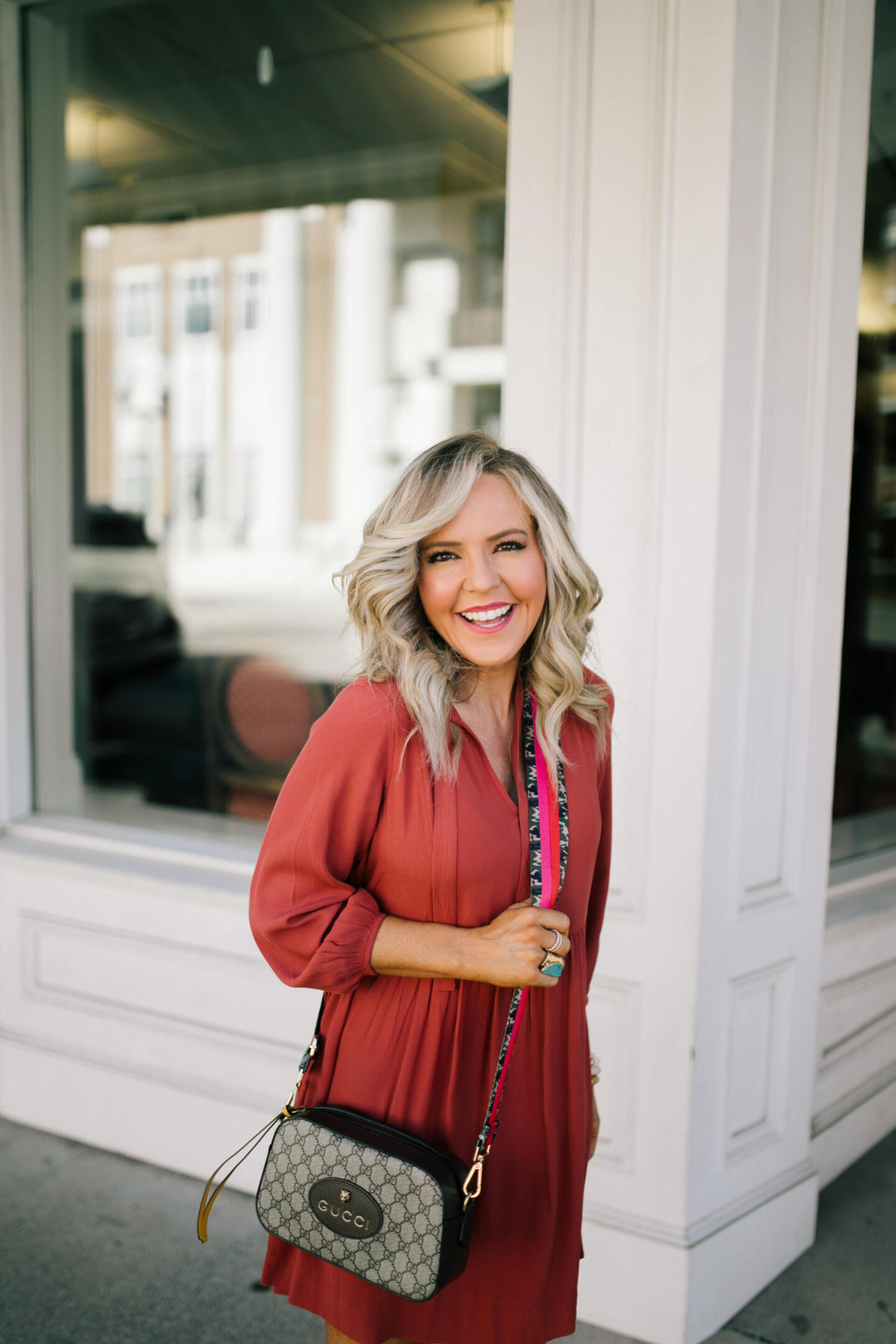 Bag Straps by popular Nashville fashion blog, Hello Happiness:image of Natasha Stoneking carrying a bag with a Social Threads bag strap. 