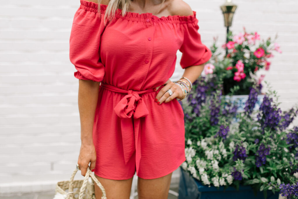 Gibson Look Road Trip by popular Nashville fashion blog, Hello Happiness: image of Natasha Stoneking wearing a Gibson Look Gibsonlook x Hello Happiness Off the Shoulder Tie Waist Romper, Hat Attack Freedom Tote, Sole Society AUDRINA FLATFORM ESPADRILLE, Lisi Lerch MARY gold earrings, and Quay Big Love sunglasses. 