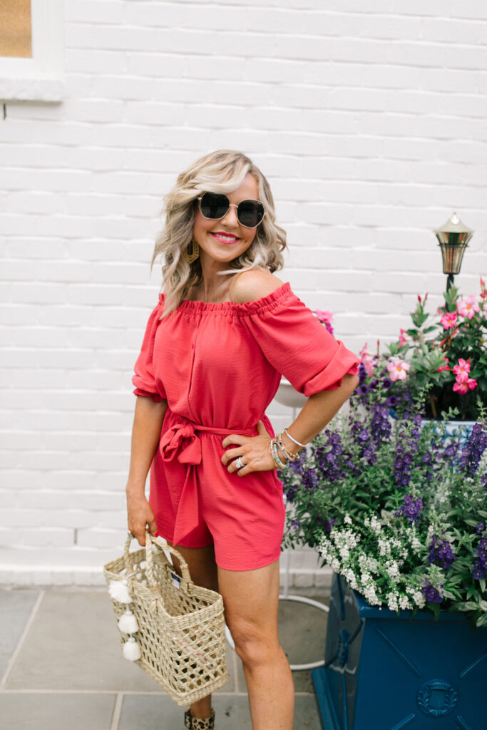 Gibson Look Road Trip by popular Nashville fashion blog, Hello Happiness: image of Natasha Stoneking wearing a Gibson Look Gibsonlook x Hello Happiness Off the Shoulder Tie Waist Romper, Hat Attack Freedom Tote, Sole Society AUDRINA FLATFORM ESPADRILLE, Lisi Lerch MARY gold earrings, and Quay Big Love sunglasses. 