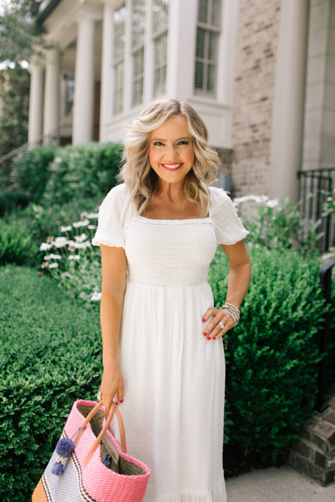 Gibson Look Road Trip by popular Nashville fashion blog, Hello Happiness: image of Natasha Stoneking wearing a Gibsonlook x Hello Happiness Puff Sleeve Smocked Maxi Dress, Hat Attack Large Tuscan Tote, ShopBop See by Chloe Glyn Wedge Espadrilles, and ShopBop Shashi Bloom Earrings.  