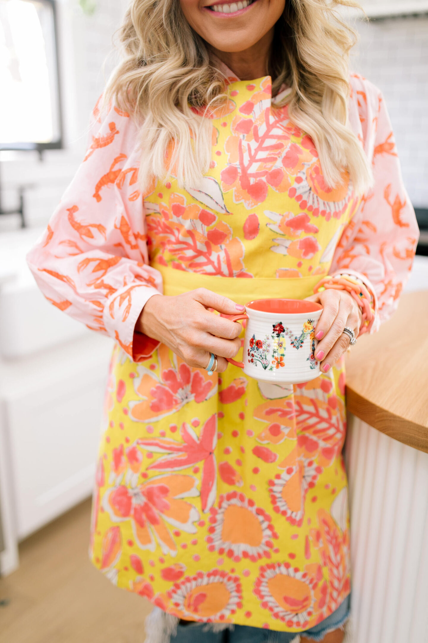 4th of July Deals by popular Nashville life and style blog, Hello Happiness: image of Natasha Stoneking wearing a Anthropologie perennial apron. 