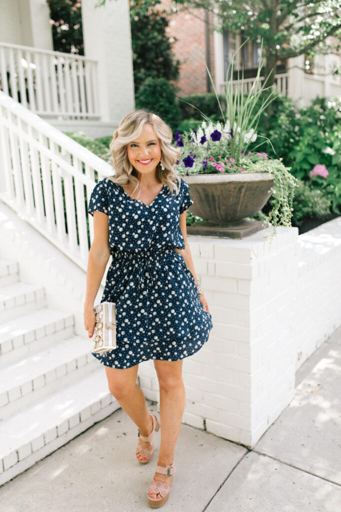Gibson Look Road Trip by popular Nashville fashion blog, Hello Happiness: image of Natasha Stoneking wearing a Gibsonlook x Jess Fay Smocked Detail V Neck Blouse, Gibsonlook x Jess Fay Tiered Skirt, See by Chloe Kristy heel sandals, Hat Attack Jewel Box clutch, Quay Big Love glasses, and BaubleBar BIRCH DROP EARRINGS. 