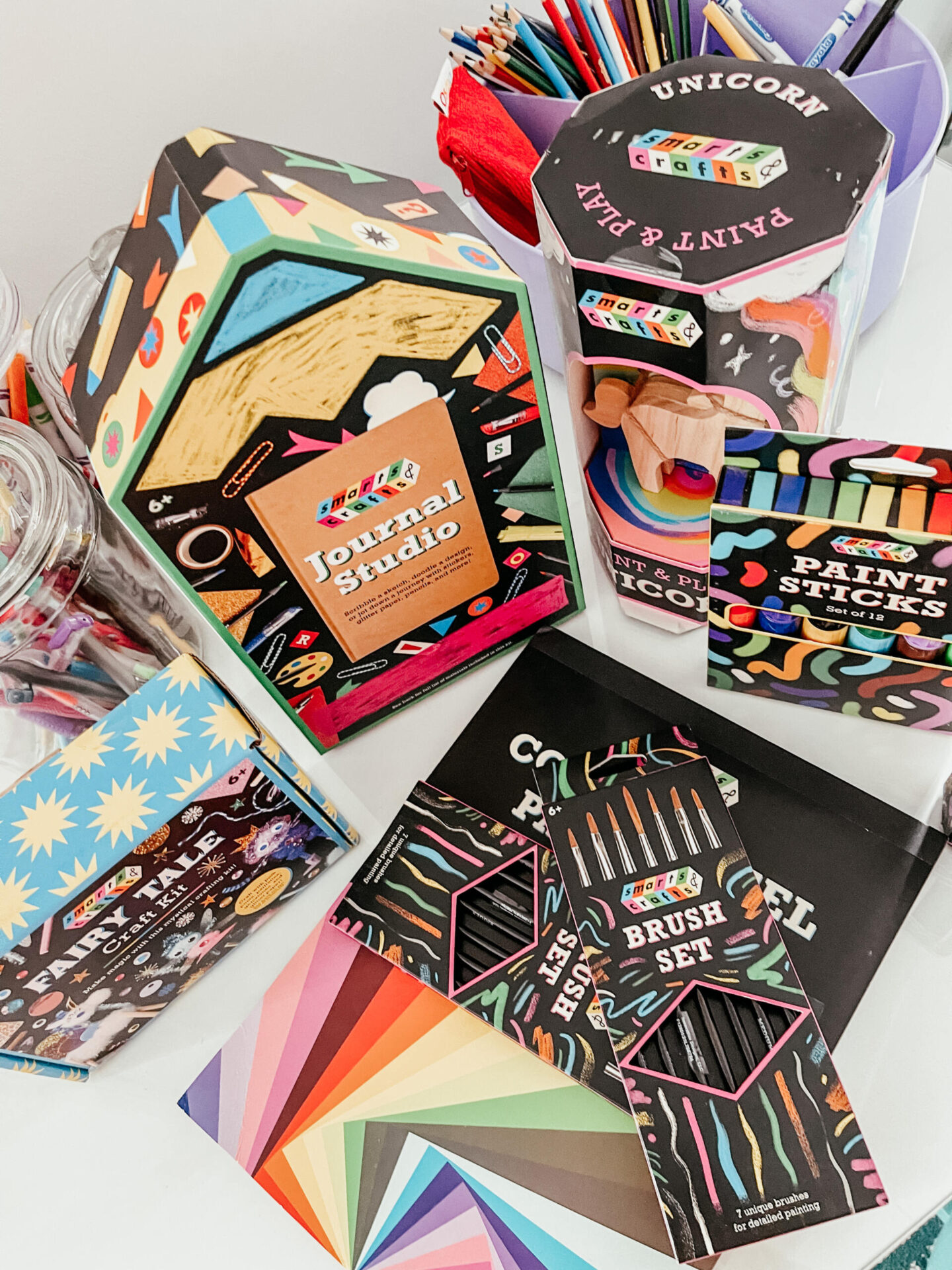 Smarts and Crafts by popular Nashville lifestyle blog, Hello Happiness: image of Smarts and Crafts journal studio, paint and play, paint sticks, brush set, and fairy tale craft kit. 