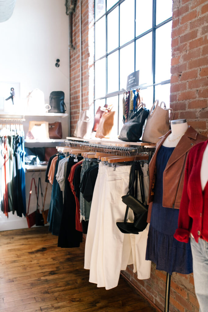 Able Clothing by popular Nashville fashion blog, Hello Happiness: image of Able clothing and purse displays. 