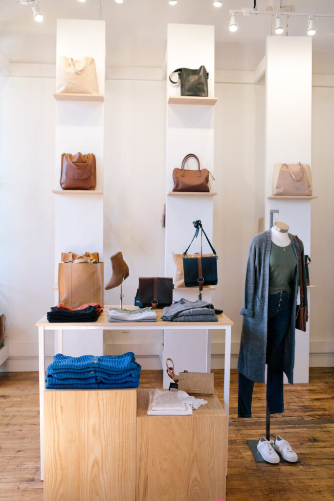 Able Clothing by popular Nashville fashion blog, Hello Happiness: image of Able Clothing and purse displays. 