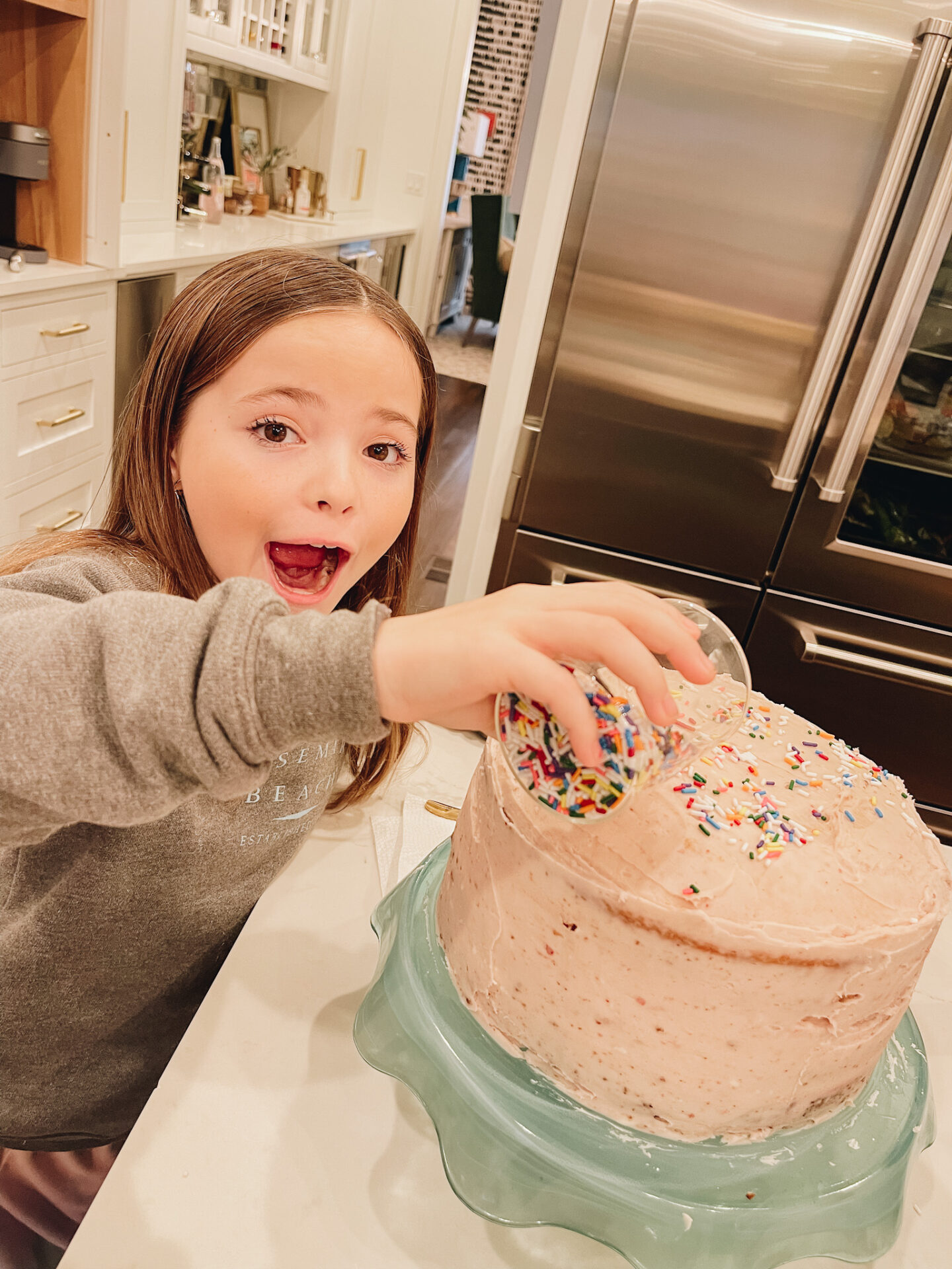 vanilla cake with cherry buttercream recipe featured by Nashville lifestyle blogger, Hello Happiness