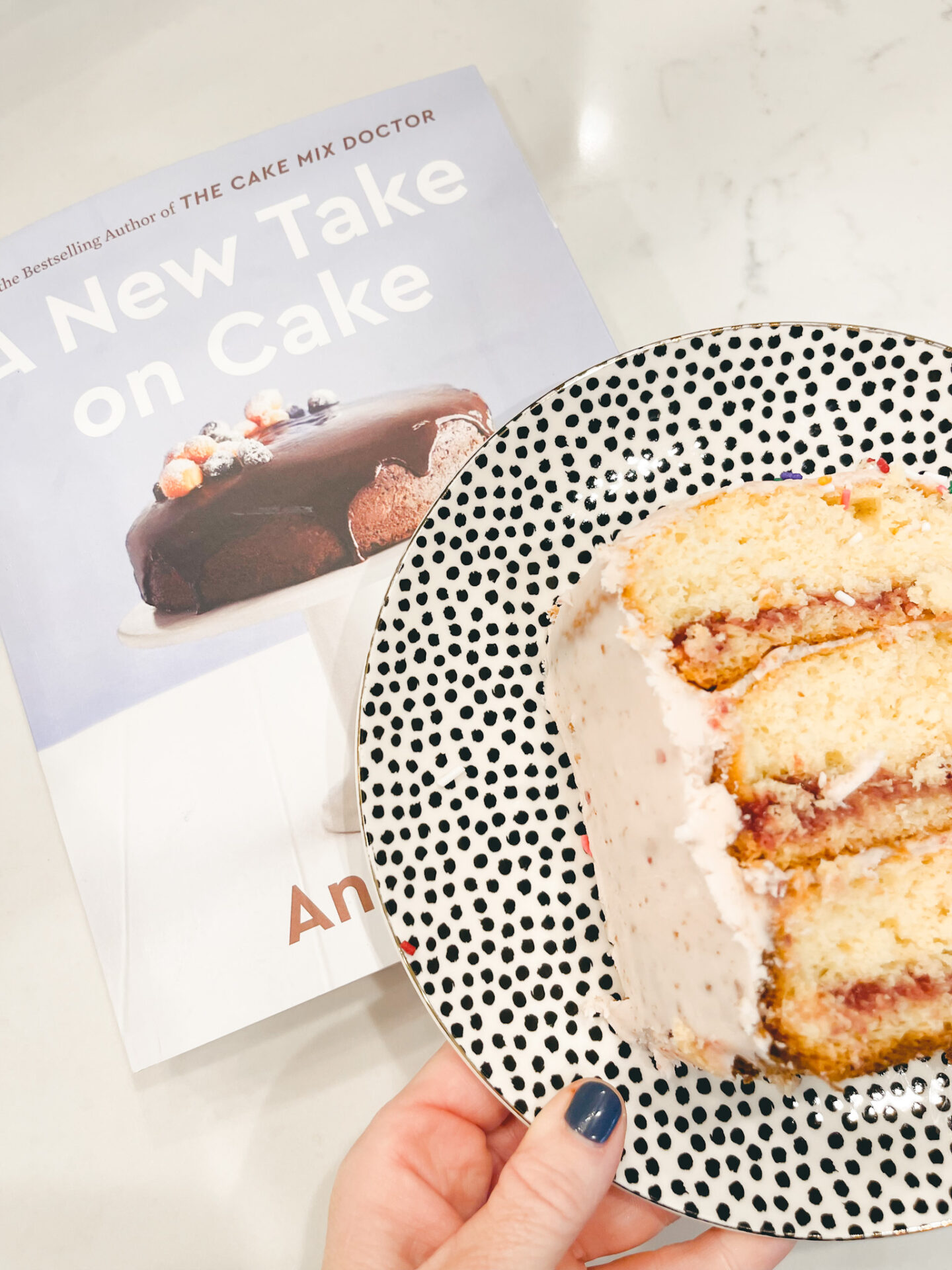 vanilla cake with cherry buttercream recipe featured by Nashville lifestyle blogger, Hello Happiness