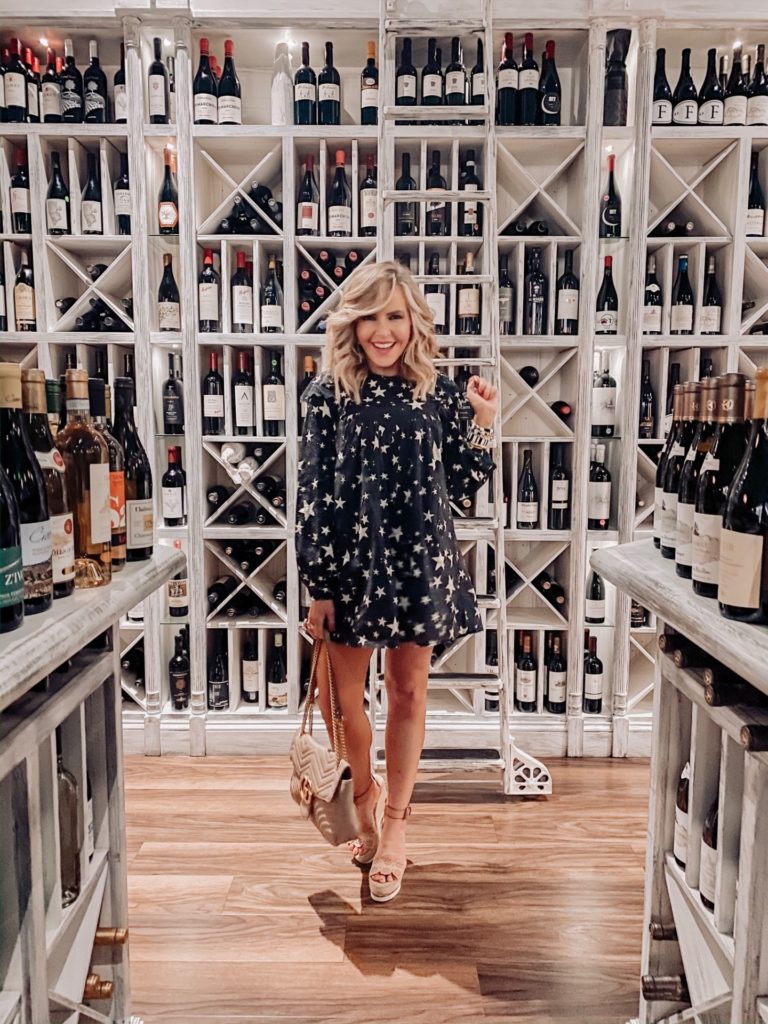 Shopbop Sale by popular Nashville fashion blog, Hello Happiness: image of a woman wearing a Shopbop FARM Rio Stardust Mini Dress.