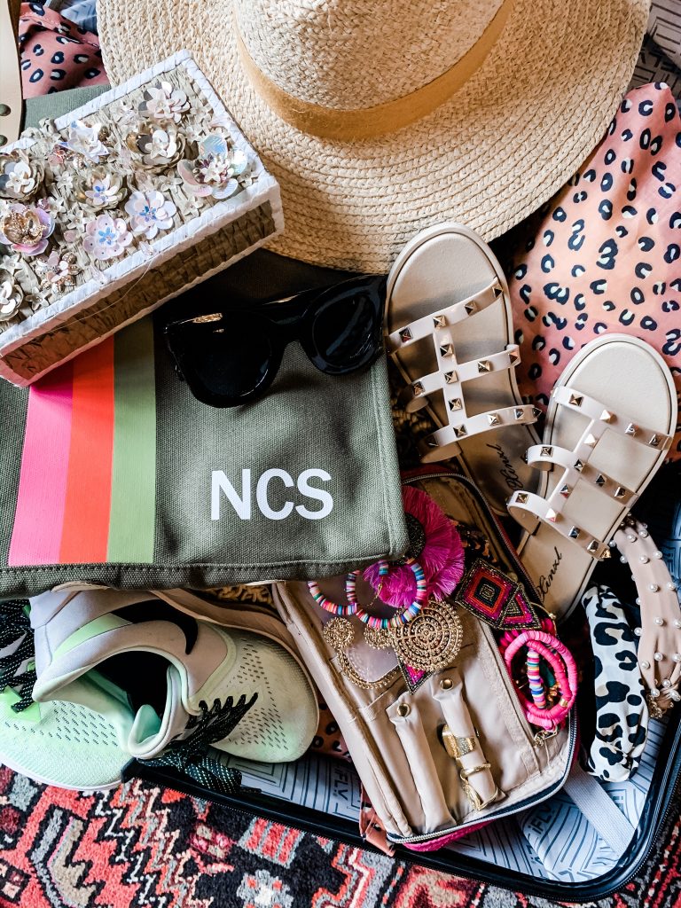 Top 10 Travel Essentials by popular Nashville life and style blog, Hello Happiness: image of Walmart iFLY Hardside Fibertech Luggage, Amazon Mossio 7 Set Packing Cubes with Shoe Bag, Joy & Lemon Womens Strappy Open Toe Mules Rivets Studs Sandal Flats, Amazon Freckles Butterfly Sunglasses Semi Cat Eye Glasses Plastic Frame Clear Gradient Lenses, Bagging Rights Army Green, TOTE-ALLY!, Amazon bagsmart Jewelry Organizer Bag, Amazon TIFENNY Bow Knot Beading Hairband, ShopBop Hat Attack Jewel Box, Amazon Nike Womens Zoom Winflo 6, and Zappos Hat Attack Day to Day Continental.