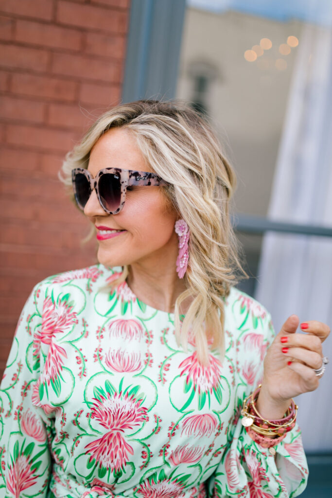 Mother's Day Gift Ideas by popular Nashville life and style blog, Hello Happiness: image of a woman wearing a Emily McCarthy PARTY SWING DRESS, Hat Attack Cotton Cord Bag, Amazon LITOON Tassel Pom Pom Key Chain, See by Chloe Glyn Platform Espadrilles, and Lisi Lerch NATALIE earrings. 