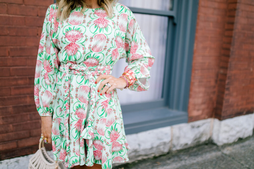 Mother's Day Gift Ideas by popular Nashville life and style blog, Hello Happiness: image of a woman wearing a Emily McCarthy PARTY SWING DRESS, Hat Attack Cotton Cord Bag, Amazon LITOON Tassel Pom Pom Key Chain, See by Chloe Glyn Platform Espadrilles, and Lisi Lerch NATALIE earrings. 