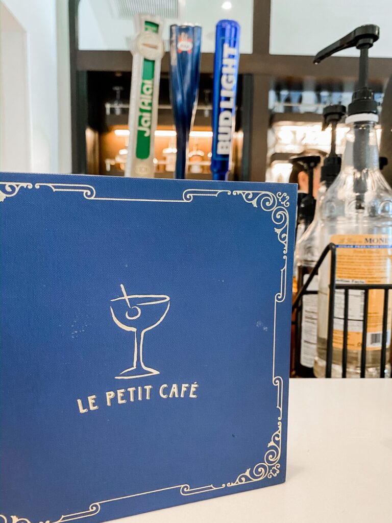 Disney Creators Celebration by popular Nashville lifestyle blog, Hello Happiness: image of a Le Petit Cafe menu. 