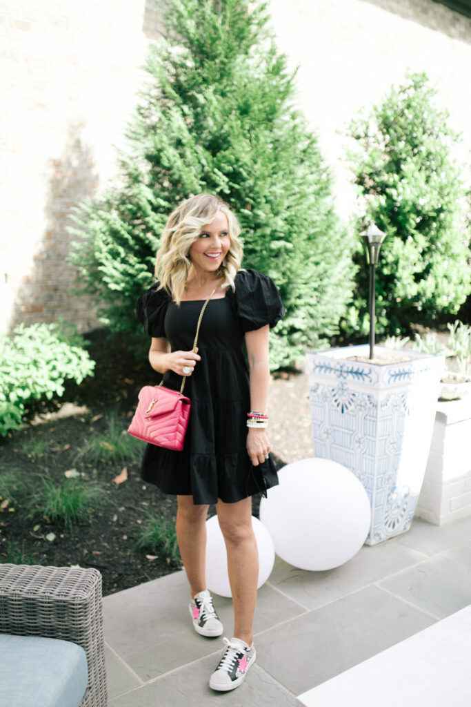 Pink Bags by popular Nashville fashion blog, Hello Happiness: image of Natasha Stoneking wearing a black puff sleeve dress, black sunglasses, Steve Madden RUBIE NATURAL MULTI, and holding a Yves Saint Laurent LOULOU SMALL IN MATELASSÉ “Y” LEATHER.