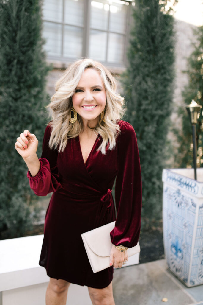 Holiday Collection by popular Nashville fashion blog, Hello Happiness: image of Natasha Stoneking wearing a Gibson x Glam velvet wrap dress. 