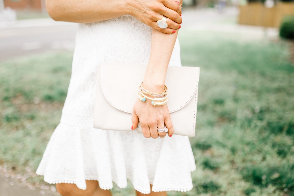 eBay Fashion Jewelry featured by top US life and style blog Hello! Happiness; Image of a woman wearing Eliza J white lace dress, New Julie Vos Penelope ring and David Yurman bracelets.