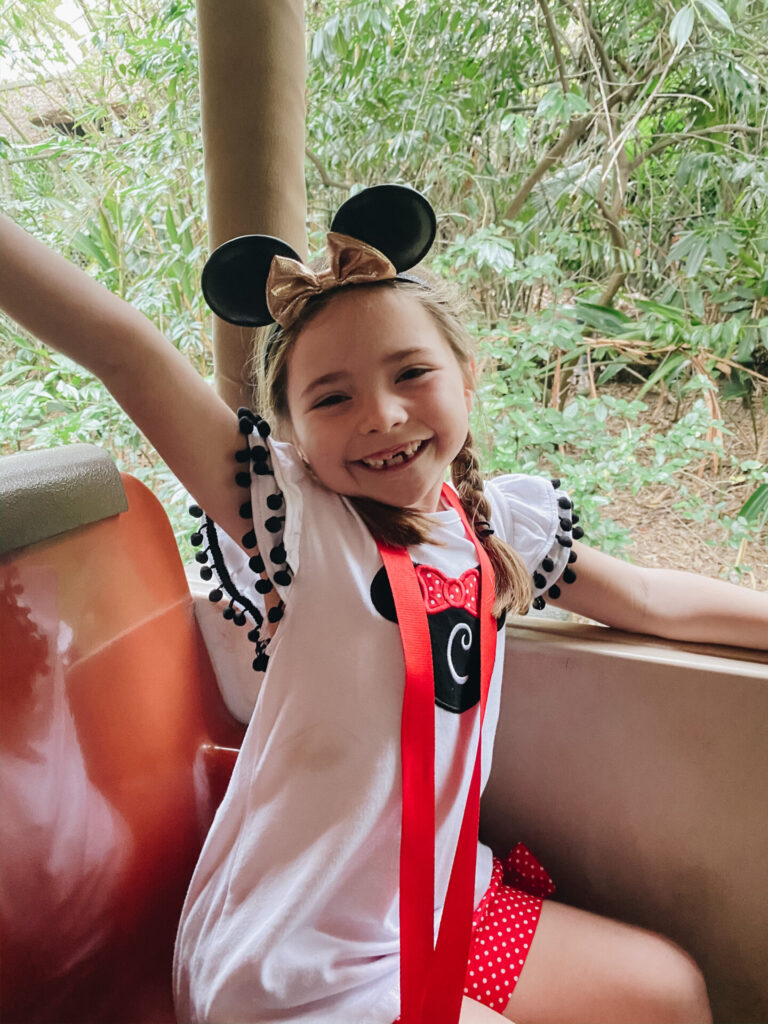 Disney Creators Celebration by poplar Nashville travel blog, Hello Happiness: image of a little girl on Walt Disney World's Kilimanjaro Safari ride. 