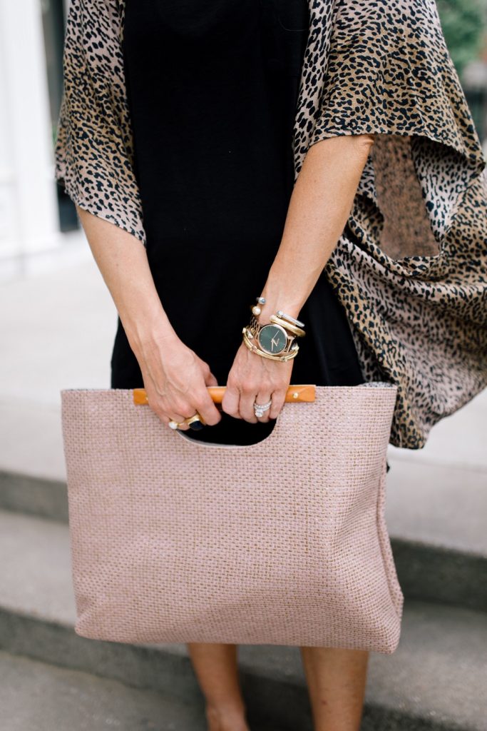 Sole Society featured by top US fashion blog Hello! Happiness; Image of a woman wearing Sole Society leopard wrap, Sole Society striped slides, Z Supply dress and Sole Society tote.