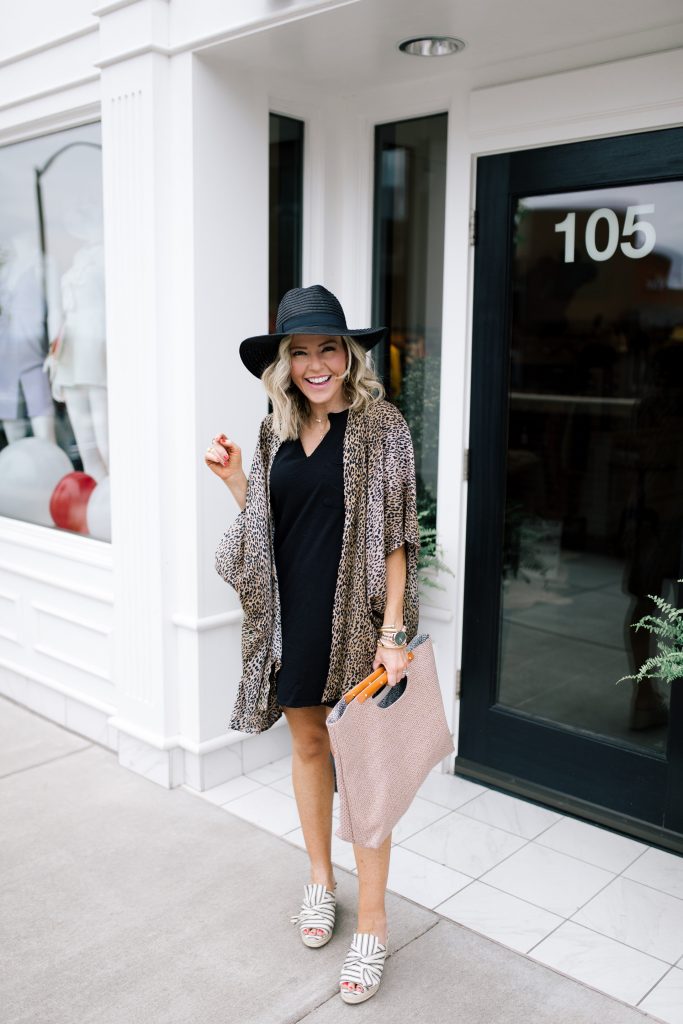 Sole Society featured by top US fashion blog Hello! Happiness; Image of a woman wearing Sole Society leopard wrap, Sole Society striped slides, Z Supply dress and Sole Society tote.