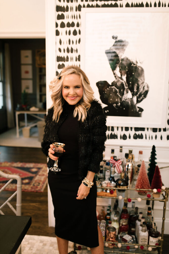 Holiday Collection by popular Nashville fashion blog, Hello Happiness: image of Natasha Stoneking wearing a collarless soft jacket and mock neck midi dress. 