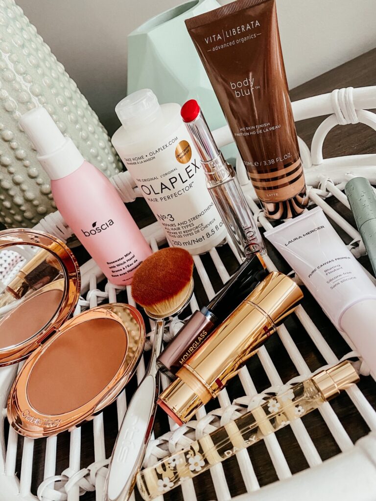 Summer Beauty by popular Nordstrom beauty blog, Hello Happiness: image of a Nordstrom Airbrush Flawless Finish Bronzing Powder CHARLOTTE TILBURY, Nordstrom Elite Oval 8 Brush ARTIS, Nordstrom Addict Stellar Shine Lipstick DIOR, Nordstrom Vanish™ Seamless Finish Foundation Stick HOURGLASS, Nordstrom Body Blur Instant HD Skin Finish VITA LIBERATA, Nordstrom Blurring Pure Canvas Primer LAURA MERCIER, Nordstrom Daisy Spray Pen MARC JACOBS, Nordstorm Better Than Sex Waterproof Mascara TOO FACED, Nordstrom On-the-Glow Blush & Illuminator WANDER BEAUTY, Nordstrom Rosewater Mist with Witch Hazel BOSCIA, and Olaplex shampoo. 