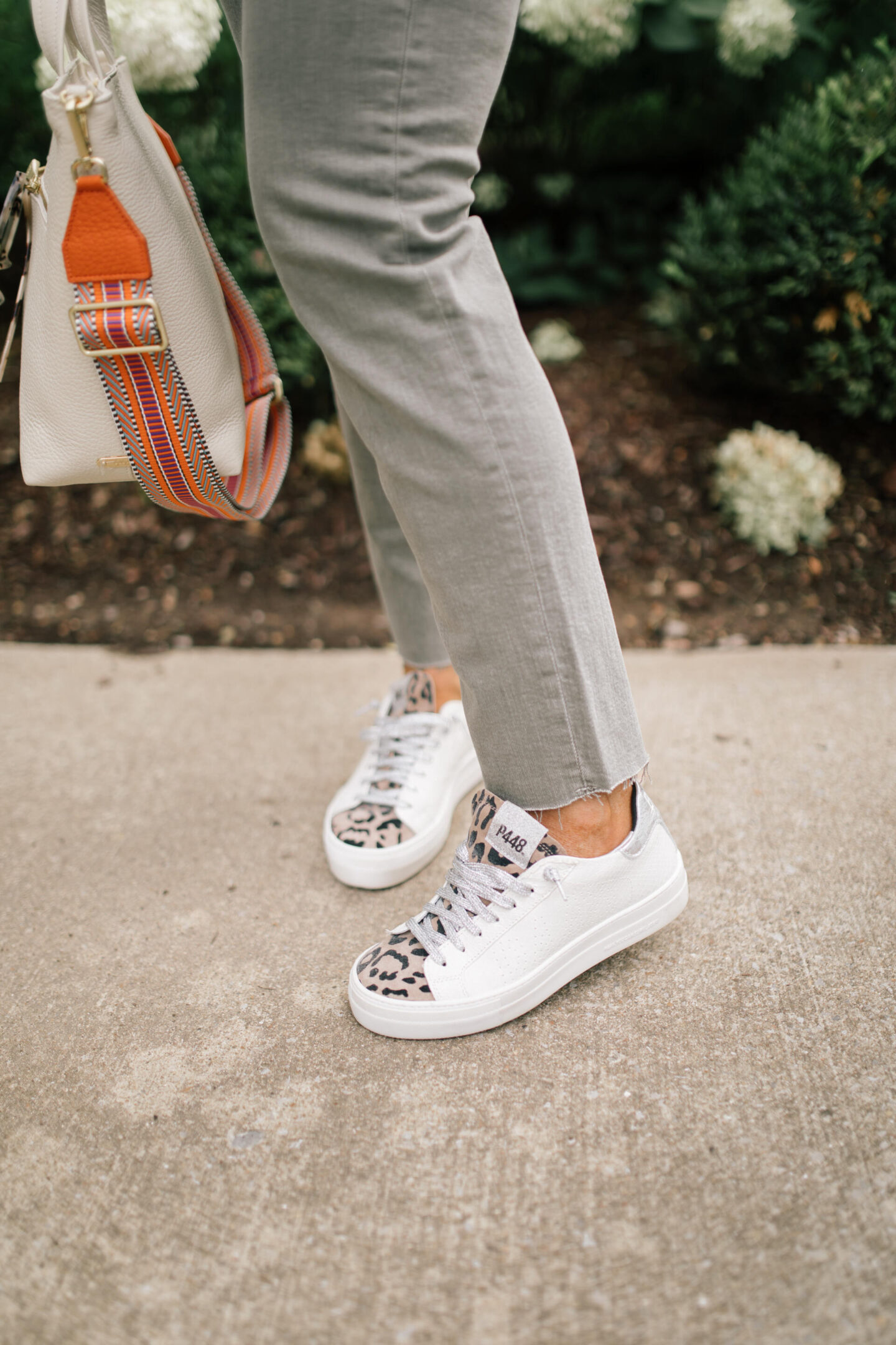 Pilcro Jeans by popular Nashville fashion blog, Hello Happiness: image of Natasha Stoneking wearing Pilcro vintage straight jeans, plaid tunic top and p448 sneakers. 
