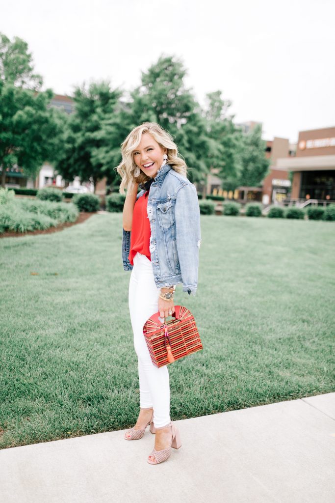 Vince Camuto Accessories featured by top US fashion blog Hello! Happiness; Image of a woman wearing Evereve top, white denim, Vince Camuto shoes and a Vince Camuto purse.