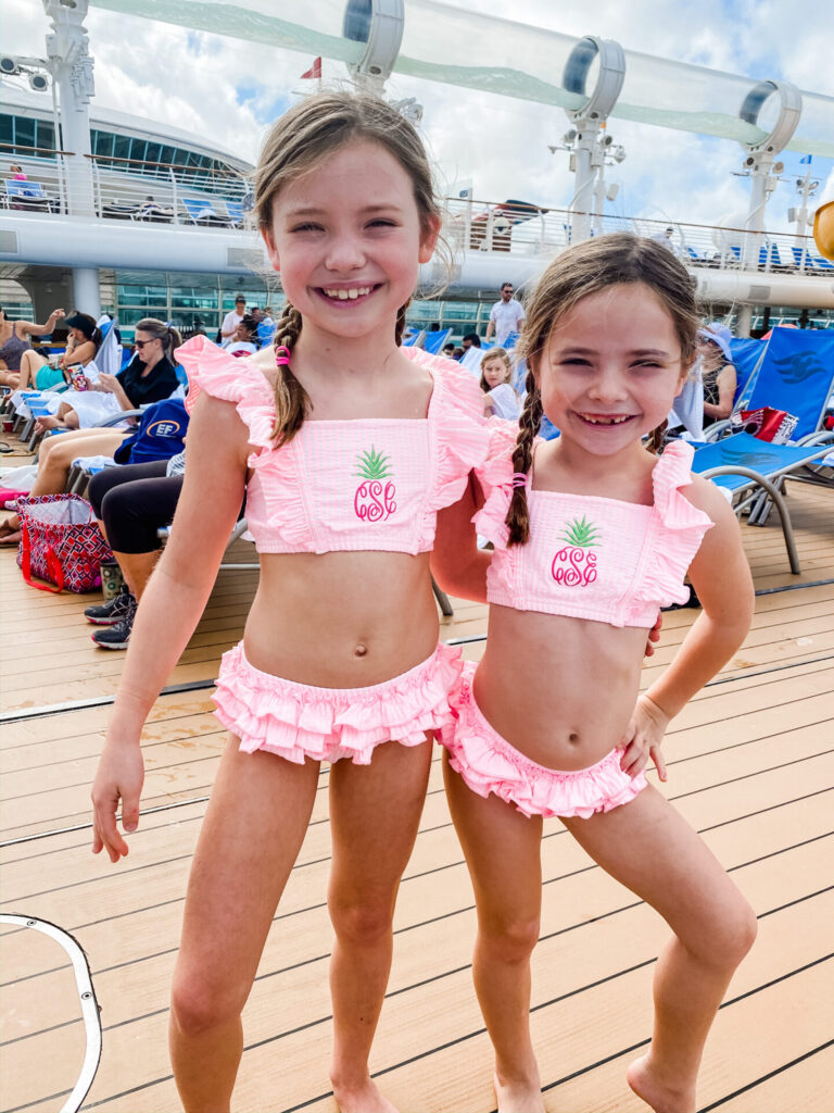 Disney Creators Celebration by popular Nashville lifestyle blog, Hello Happiness: image of two girls wearing matching pineapples seersucker bikinis. 