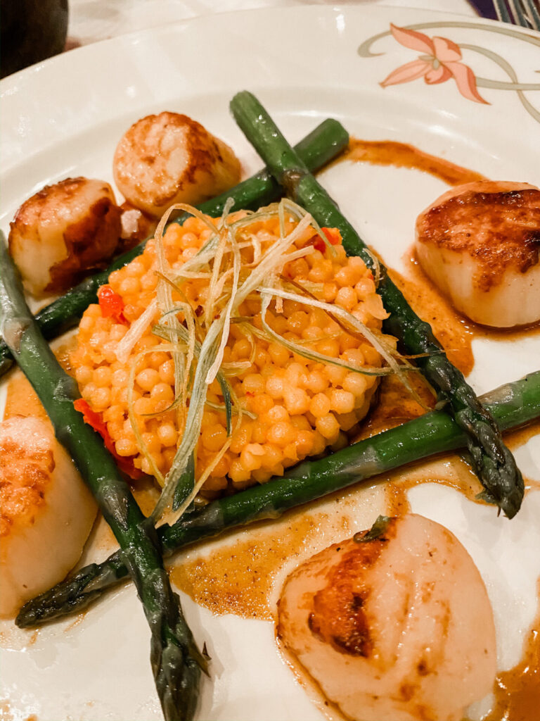 Disney Creators Celebration by popular Nashville lifestyle blog, Hello Happiness: image of a plate of seared scallops, corn, and asparagus. 