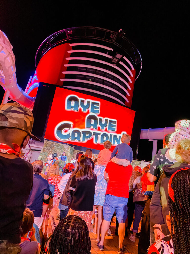 Disney Creators Celebration by popular Nashville lifestyle blog, Hello Happiness: image of a pirate party on the Disney Dream Cruise Ship. 